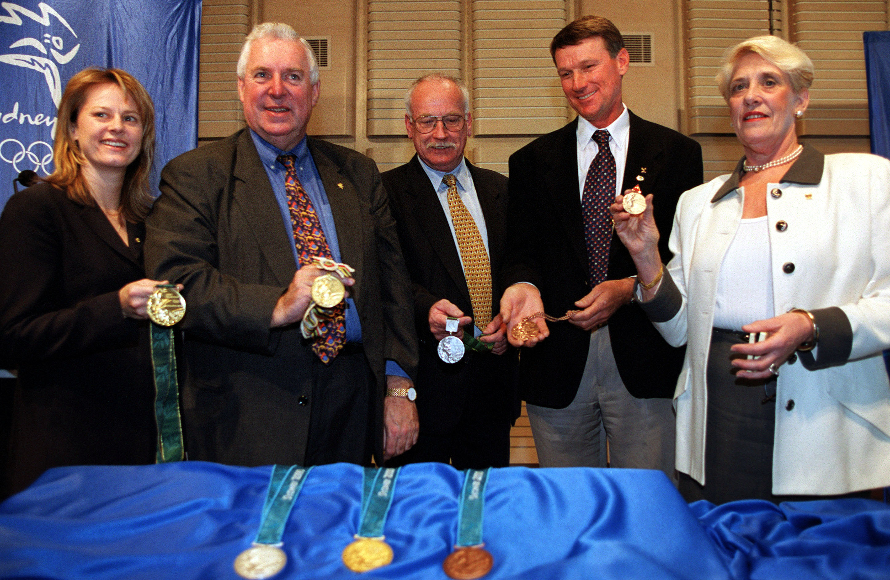 12 Aug 2000: Australian medal winners (from left) Danielle Roche (1996 Gold), Kevin Berry (1964 Gold), Peter Norman (1968 Silver), Ian Brown (1976 Bronze) and Sandra Morgan (1956 Gold) pose with medals during a press conference at the Sydney Opera Housein Sydney, Australia. Mandatory Credit: Adam Pretty/ALLSPORT